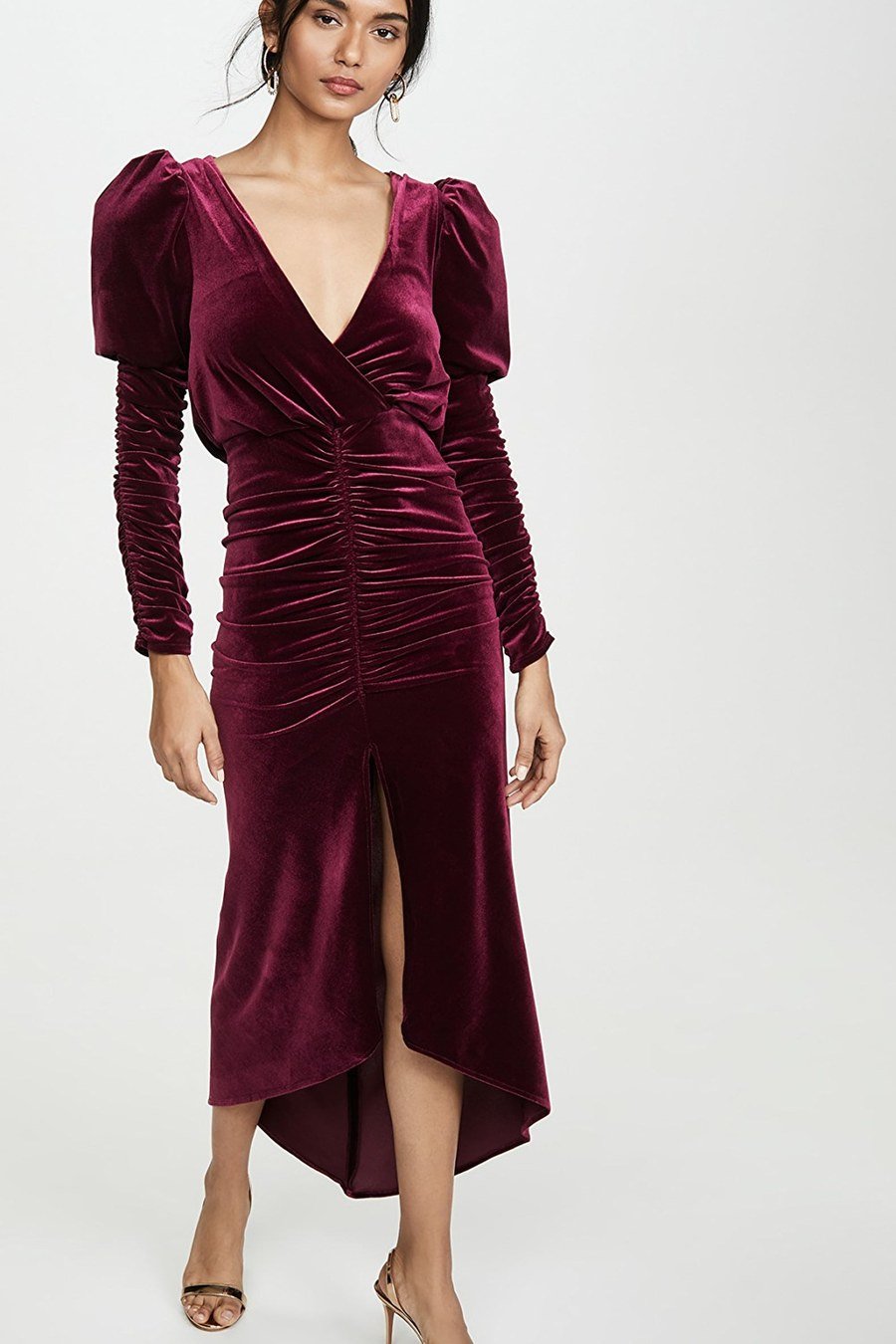 Burgundy velvet midi wrap dress with gold heels