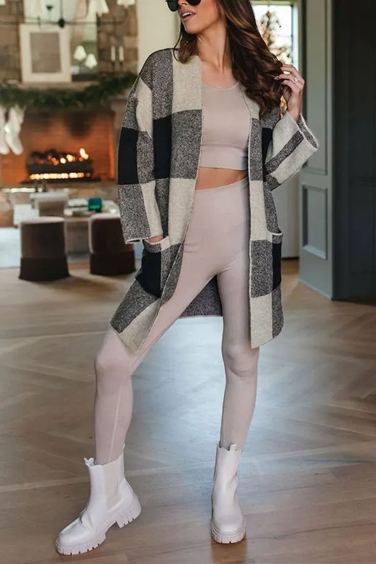 Oversized plaid cardigan with leggings and white boots, a cozy plaid winter outfit
