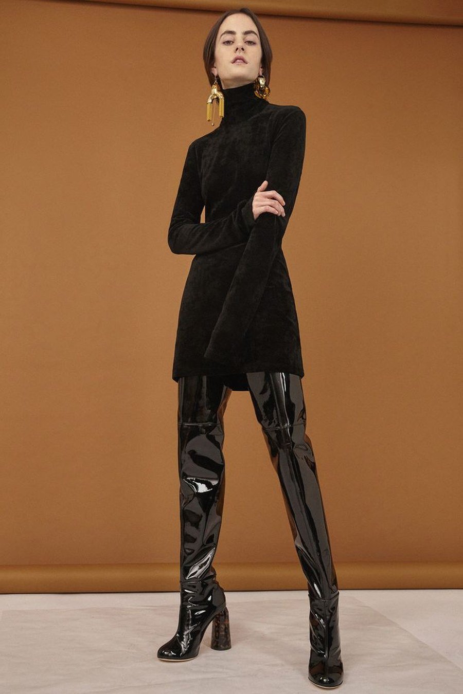 Black velvet tunic with leggings and tall boots