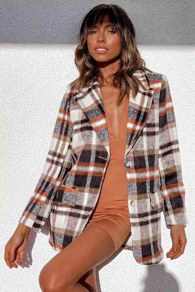 Oversized plaid blazer over a slip dress, a chic plaid winter outfit for date night