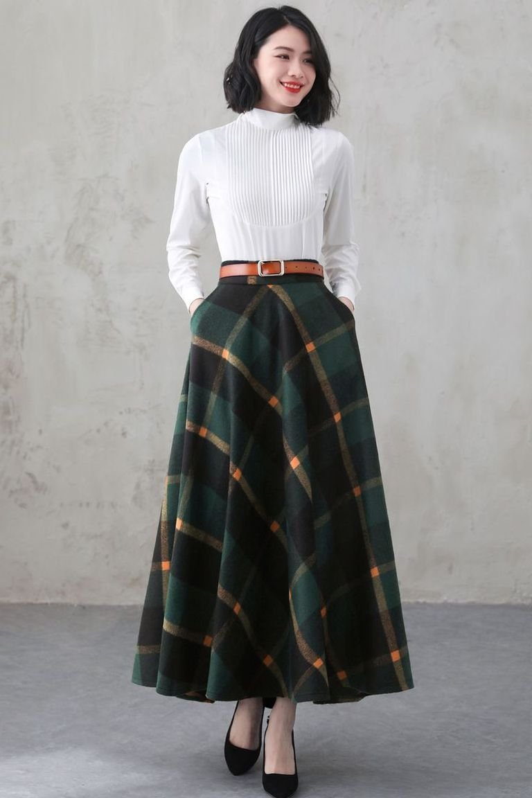Green plaid long skirt with a white blouse, a rich plaid winter outfit for the office