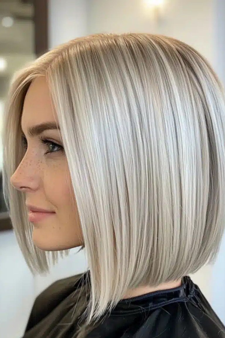 Sleek platinum blonde jaw length bob with icy precision