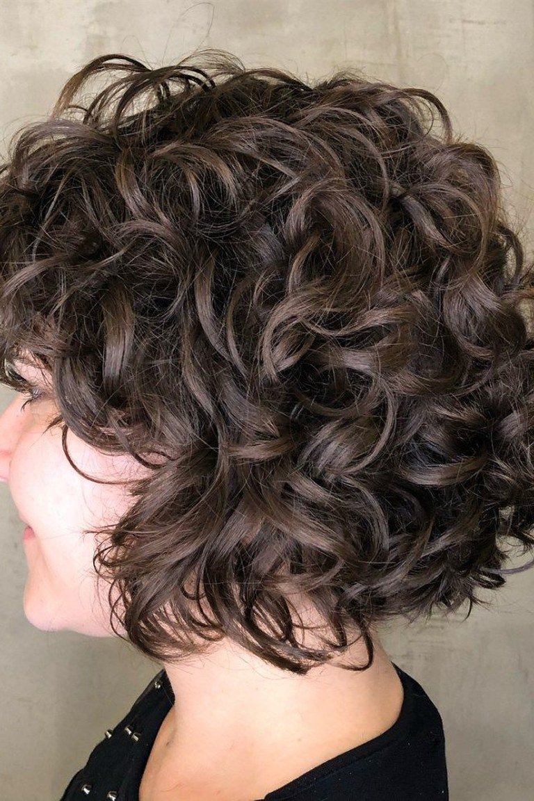 Curly jaw length bob with defined curls shaped to the jawline