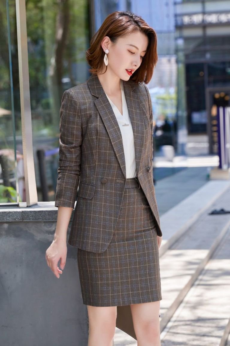 Plaid pencil skirt with a cream blouse and blazer, a polished plaid winter office outfit