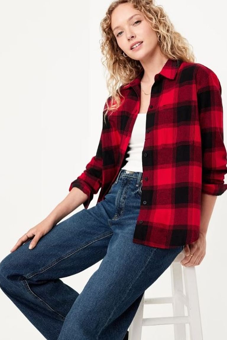 Red plaid flannel shirt with dark jeans and boots, a classic casual plaid winter outfit for women
