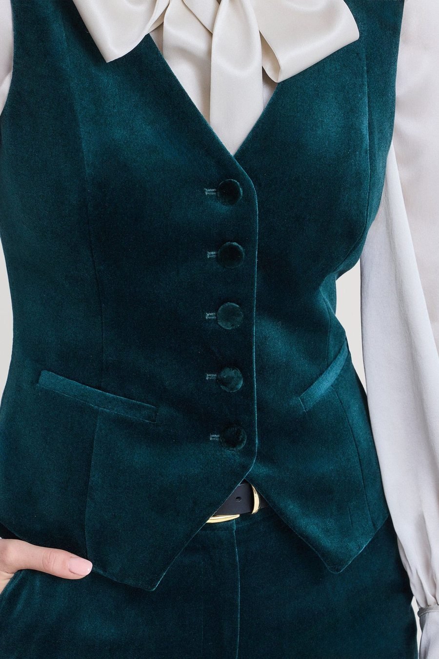 Velvet waistcoat with white shirt and straight jeans
