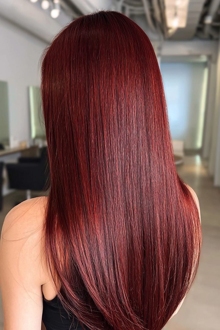 Long straight sangria burgundy hair, bright pinkish red