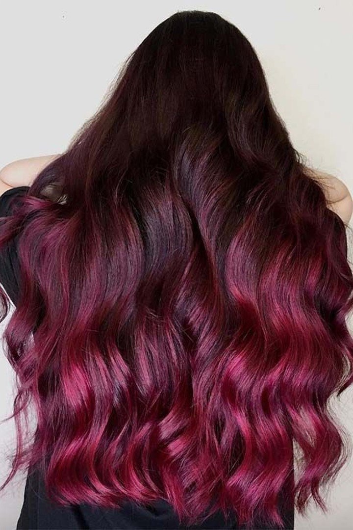 Burgundy ombre hair, dark roots melting into burgundy ends