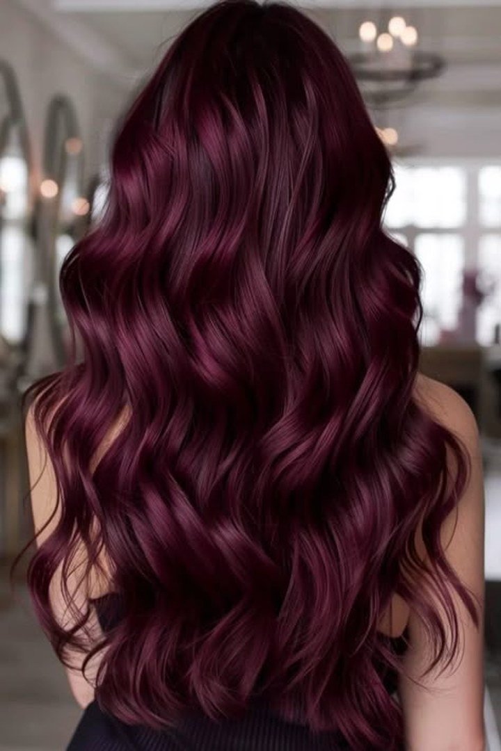 Long romantic burgundy mermaid waves, flowing wine-red hair