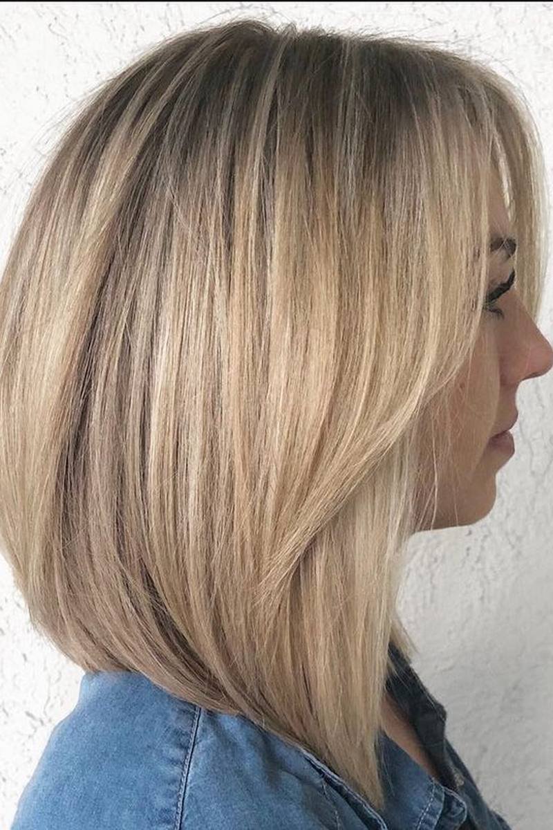 Long layered bob with curtain bangs