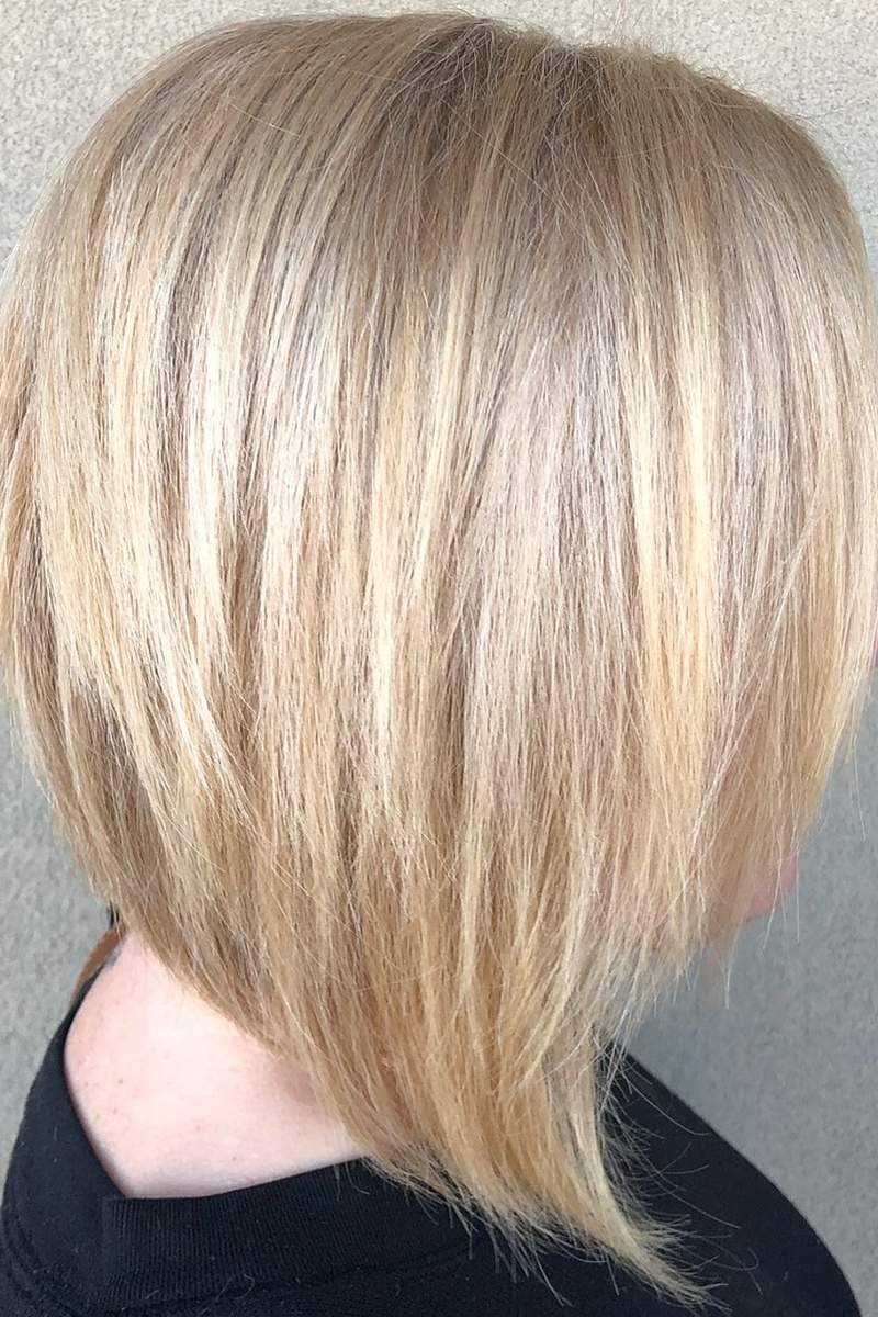 Feathered layered bob adding softness to fine hair