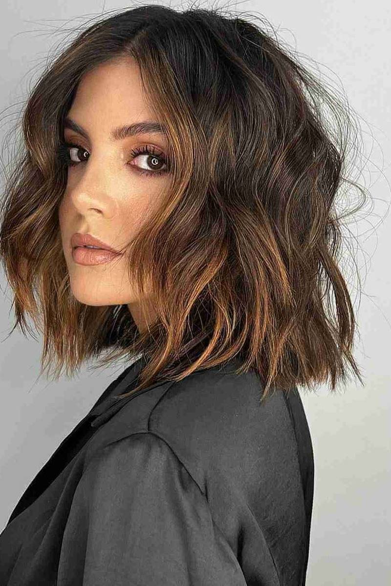 Air-dried long layered bob embracing natural texture