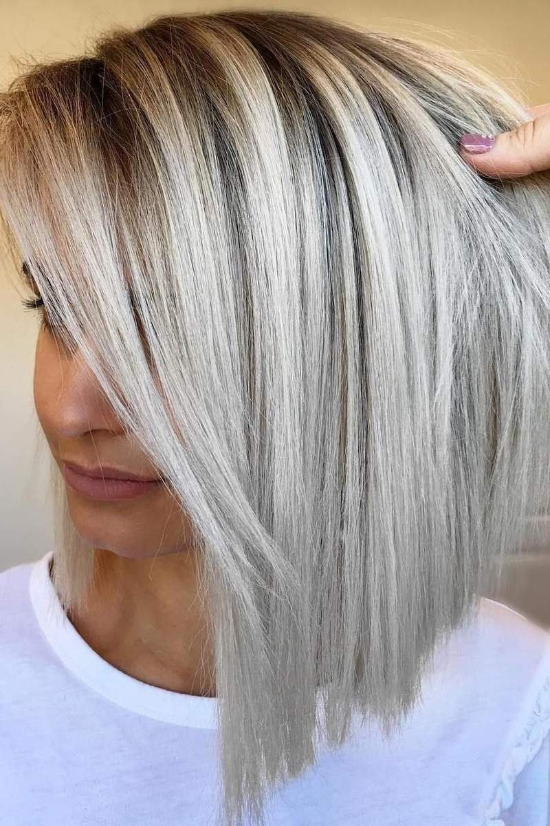 Blonde long bob with blunt edges and hidden layers