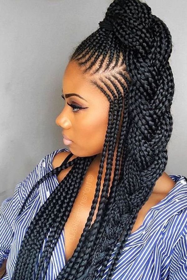 Box braids with a deep side part swept into a high half ponytail