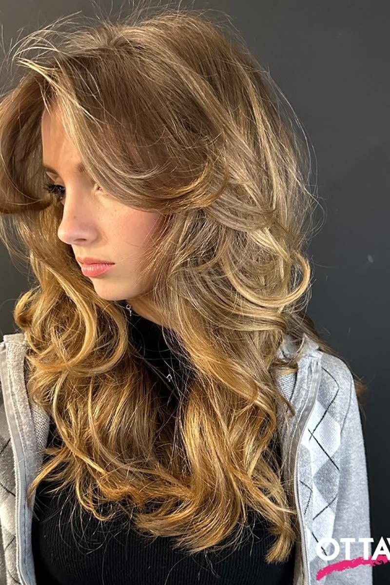 Retro butterfly haircut with vintage feathered volume