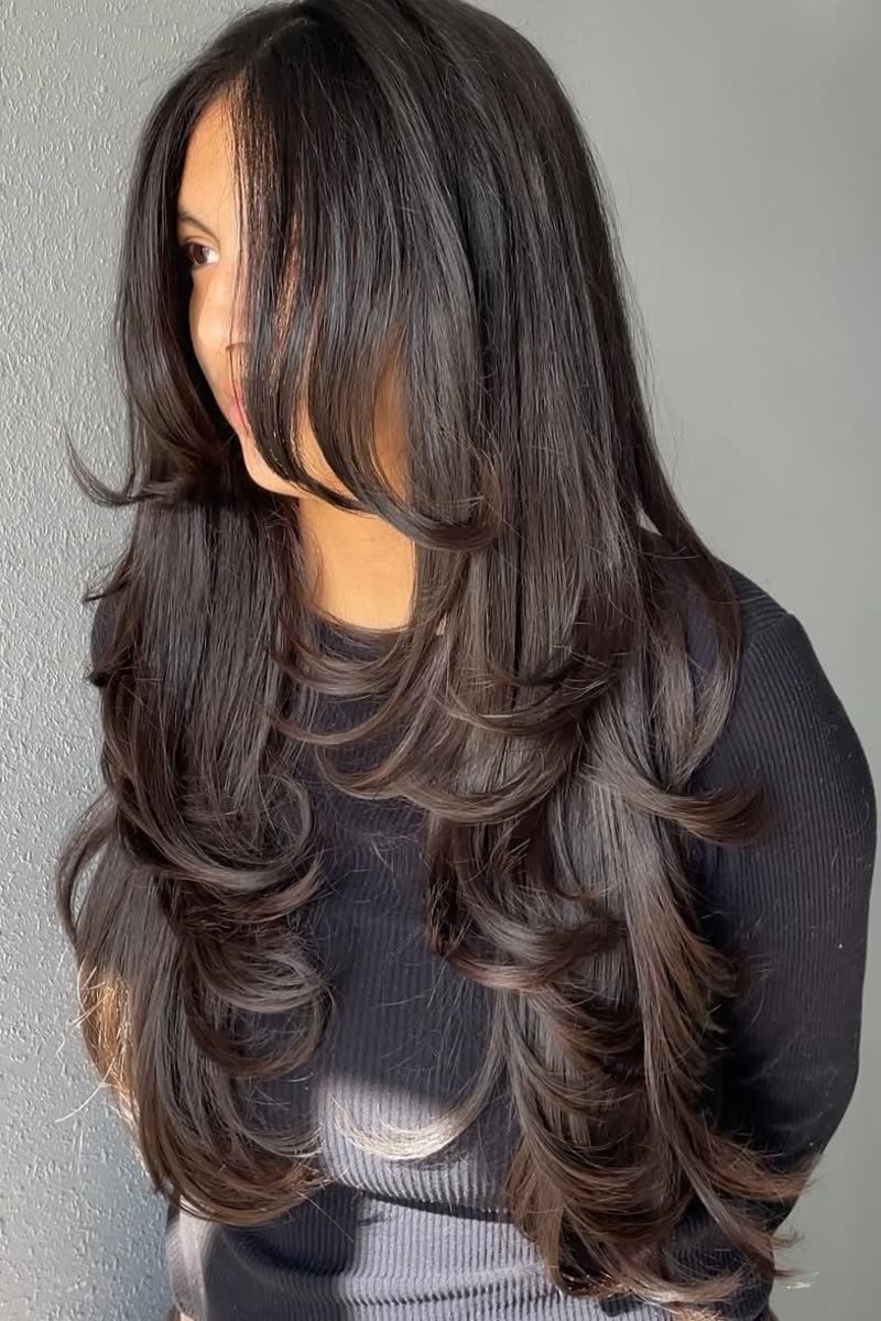 Long piece-y butterfly haircut with separated flowing layers