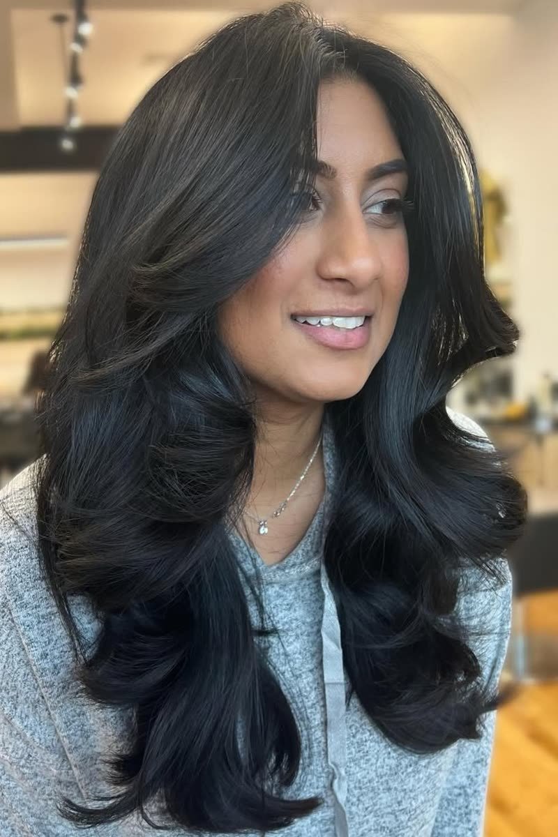 Effortless air-dried butterfly haircut with natural texture