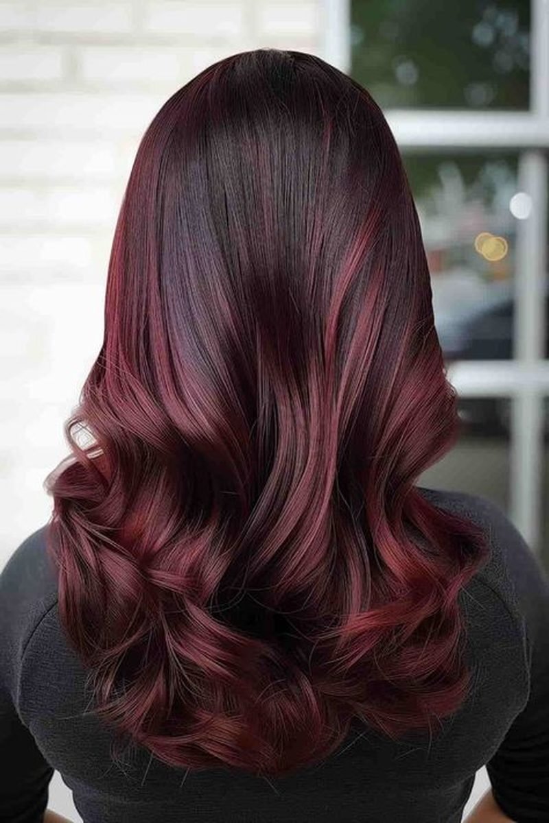 Cherry cola brunette with curtain bangs