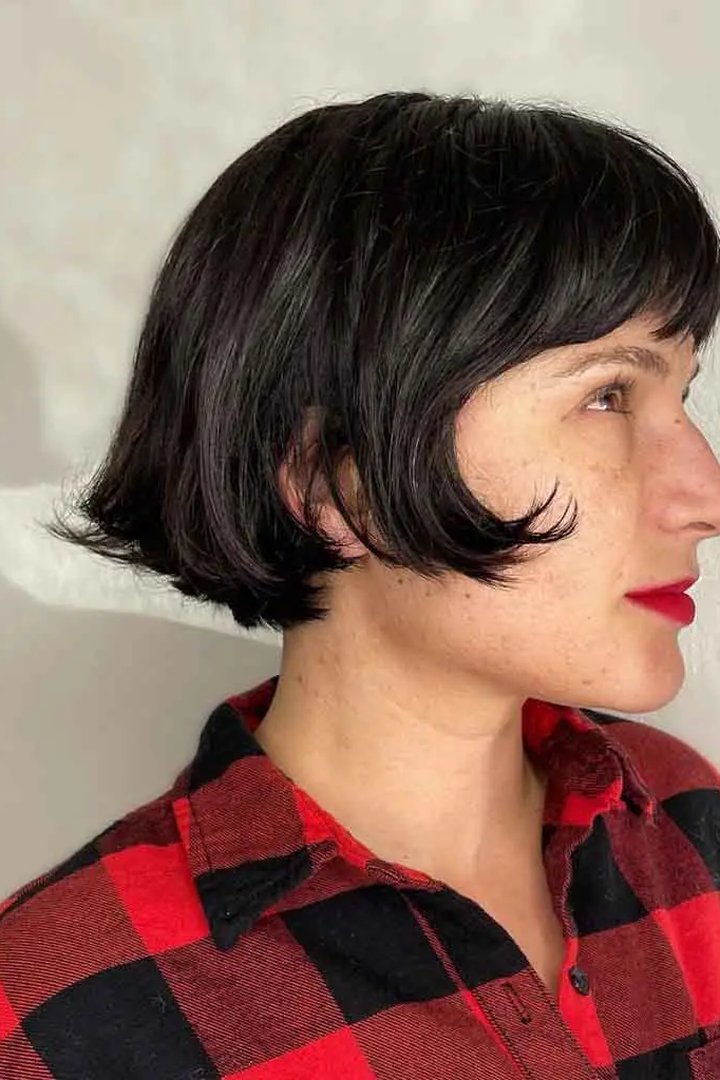 Classic chin-length french bob with wispy bangs