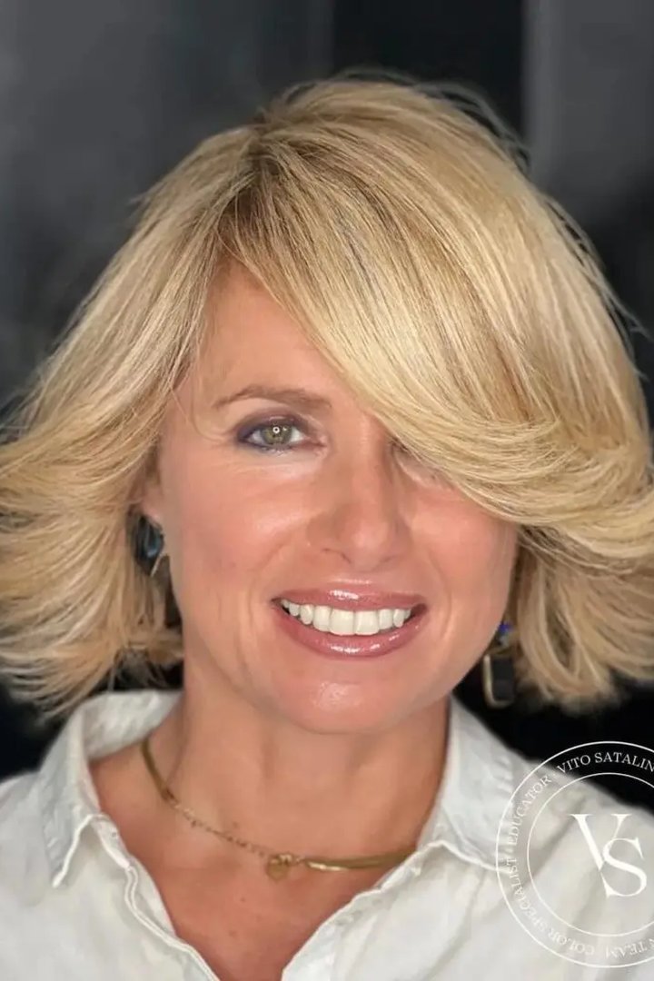 Chin-length french bob hairstyle with bangs, three-quarter view