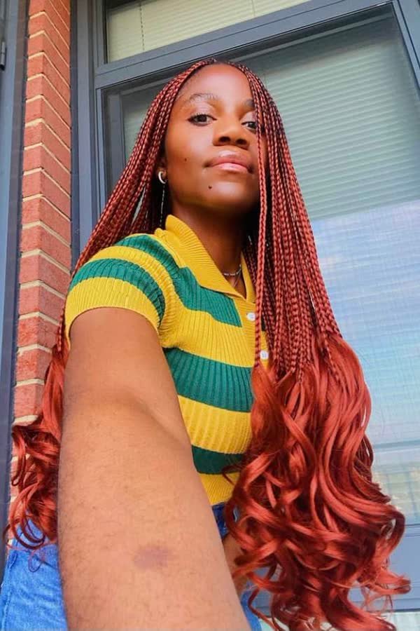 Selfie of ginger copper french curl braids with curly ends
