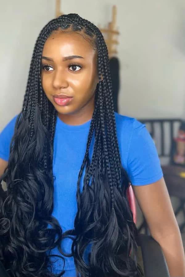 Front view of classic jet-black french curl braids with curly ends