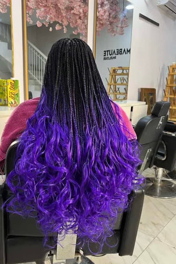 Back view of black-to-purple ombre french curl braids