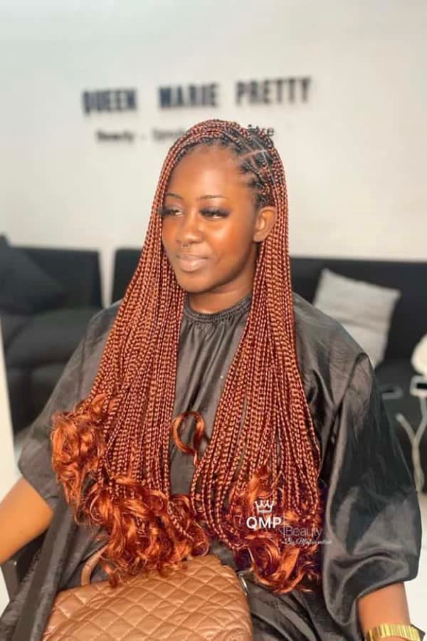 Front view of copper ombre french curl braids