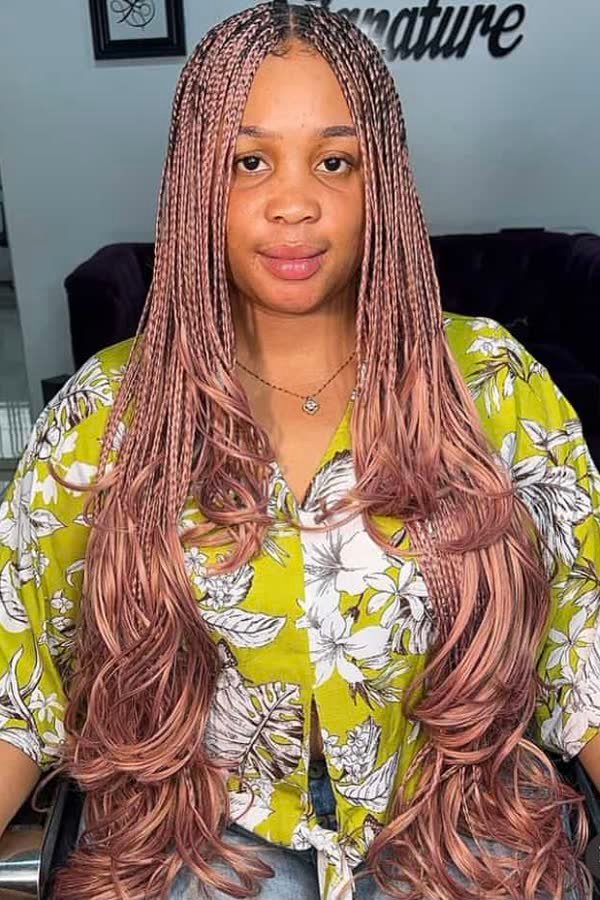 Front view of rose-gold copper french curl braids with curly ends