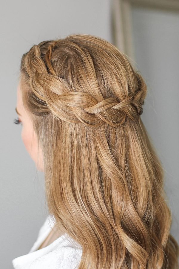 Chunky crown braid half-up hairstyle on blonde hair, back view