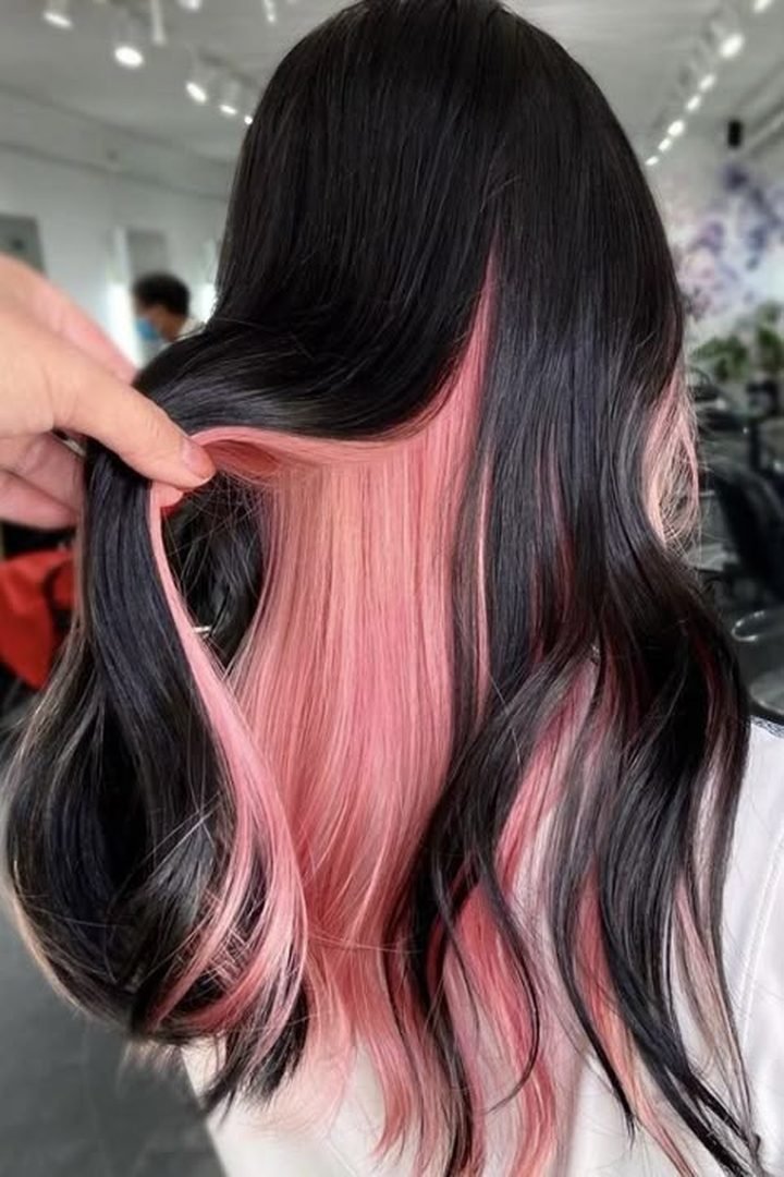 Dusty rose pink peekaboo panel on black hair, reveal view