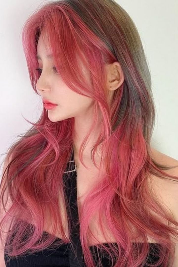 Pastel pink stripe on medium brunette hair, soft look