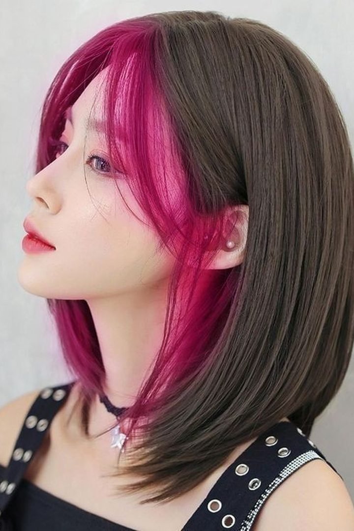 Face-framing dark pink panels on dark straight hair