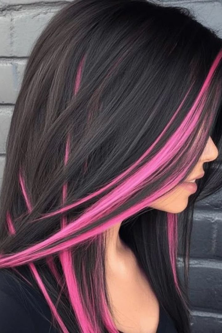 Neon pink stripe, vivid colour on dark hair