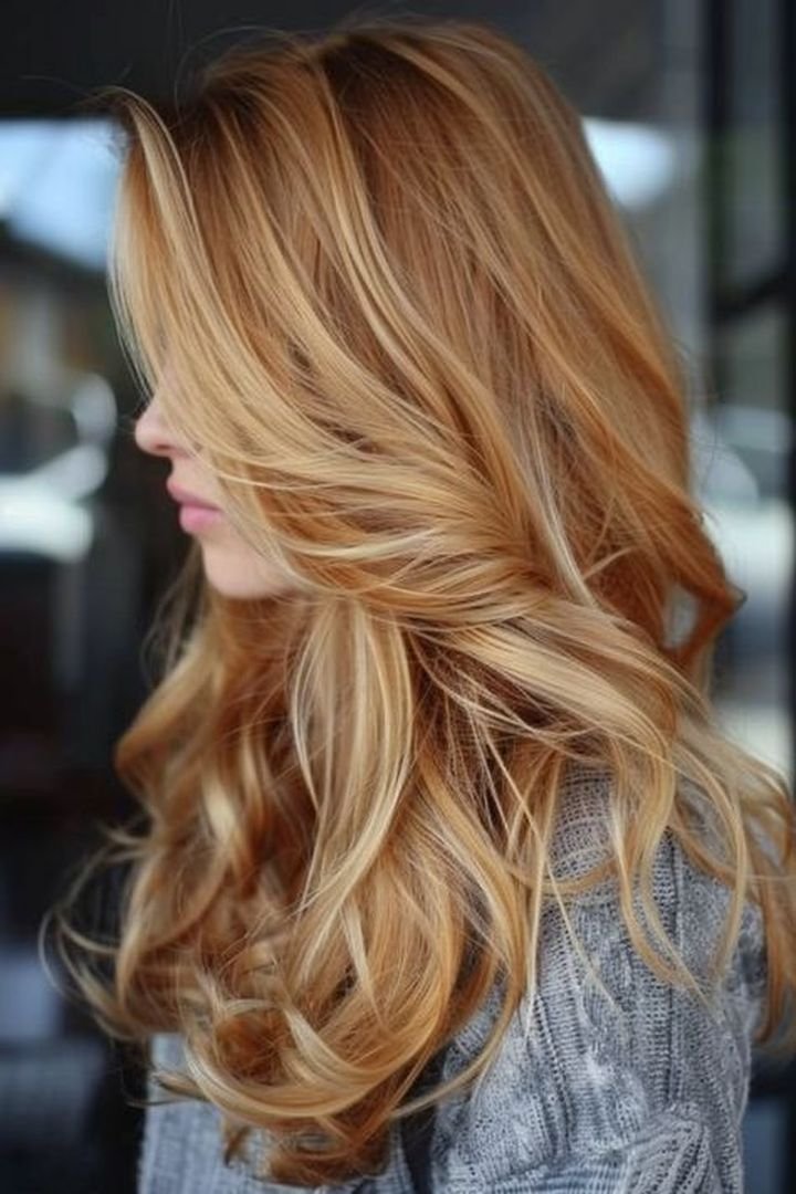 Lived in copper blonde hair with natural roots