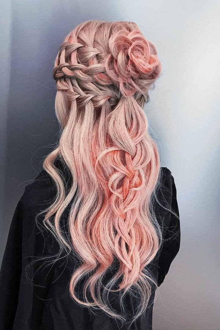 Pink stripe woven through a french braid