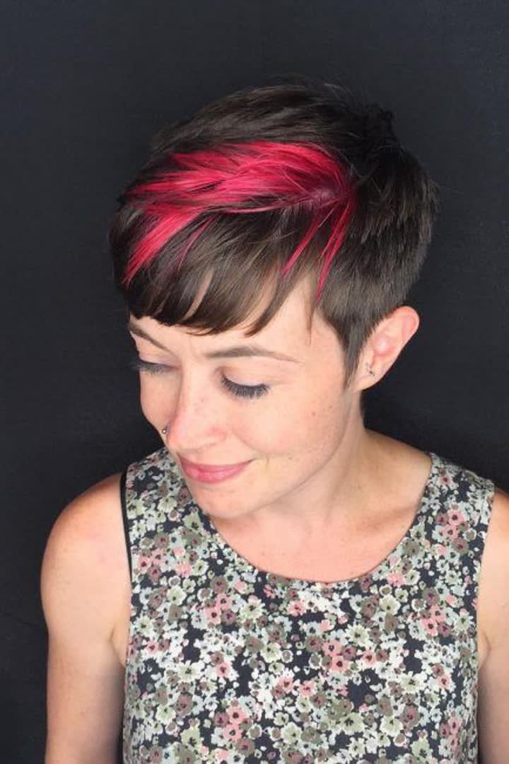 Pink stripe on a short pixie haircut