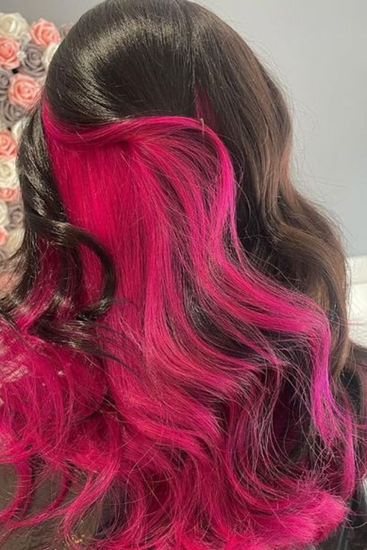 Vivid hot pink underlayer lifted to show full colour