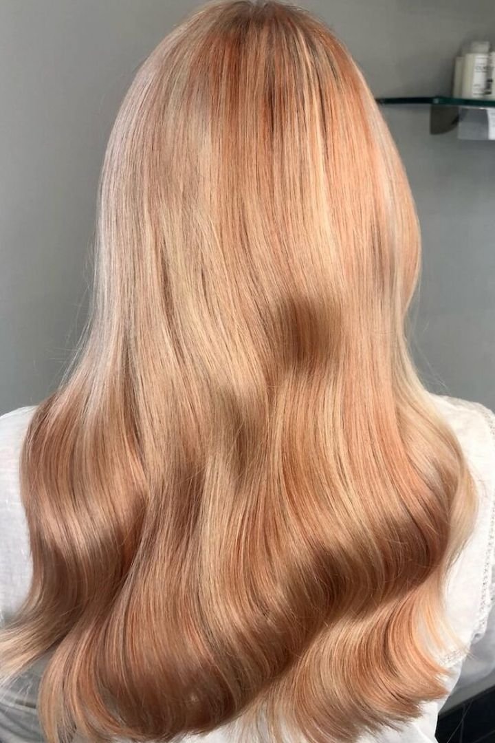 Light copper blonde balayage with brightness