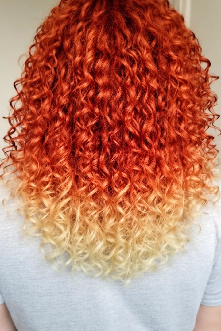 Copper blonde curls with volume