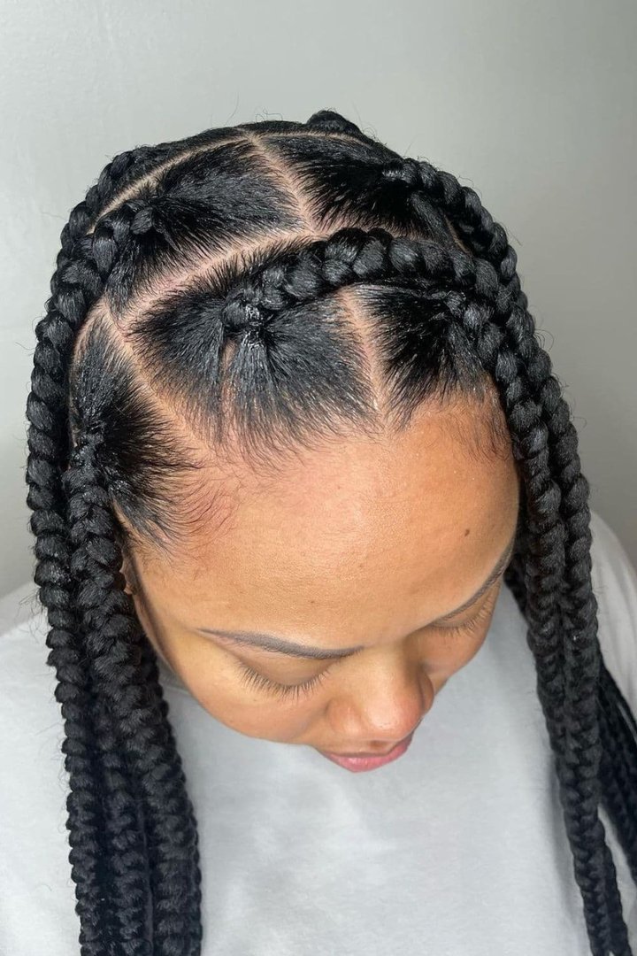 Knotless braids with a deep side part hairstyle