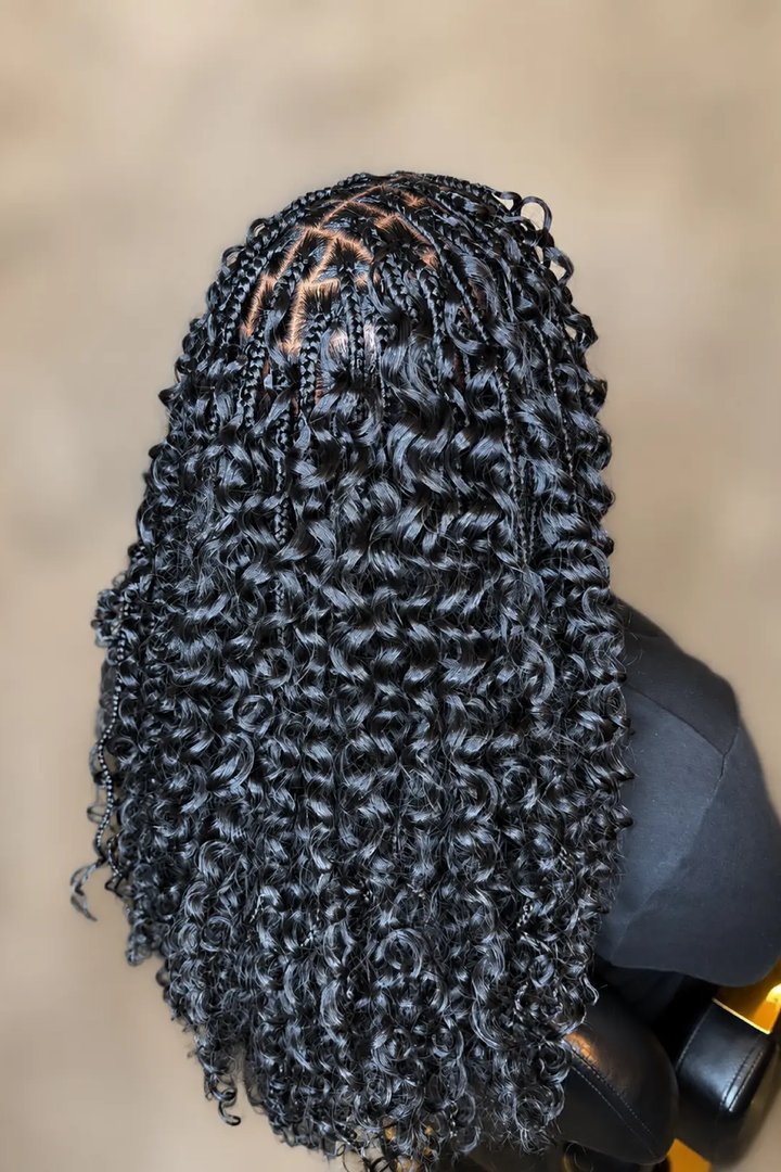 Goddess locs hybrid knotless braids hairstyle