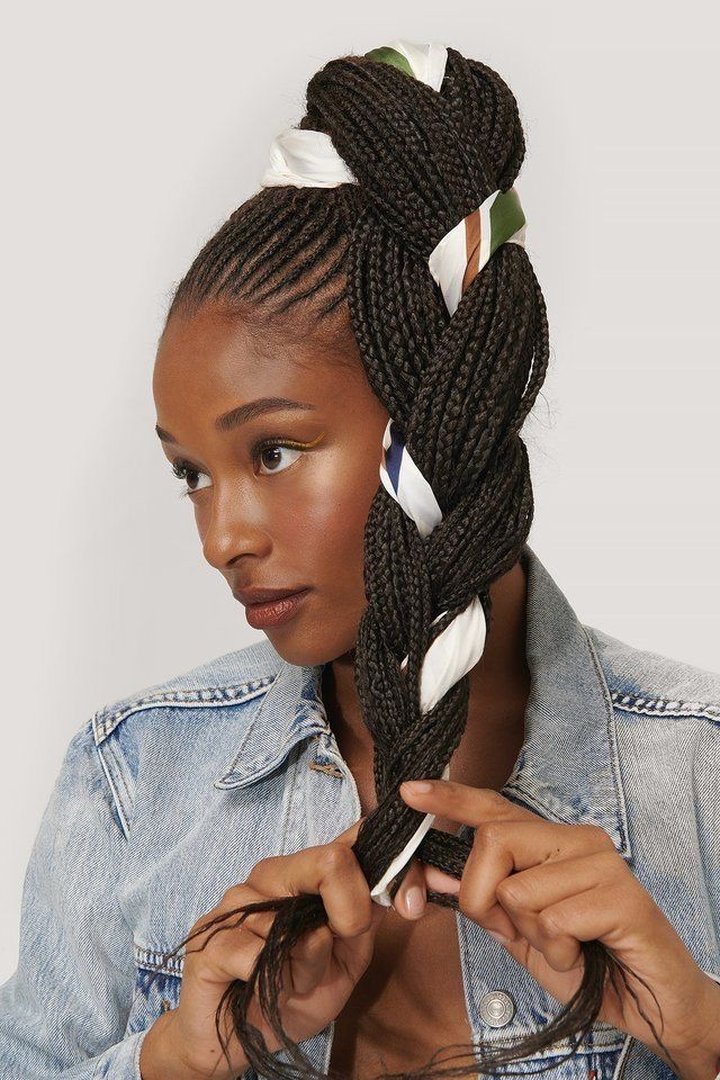 Knotless braids styled with a silk scarf tie