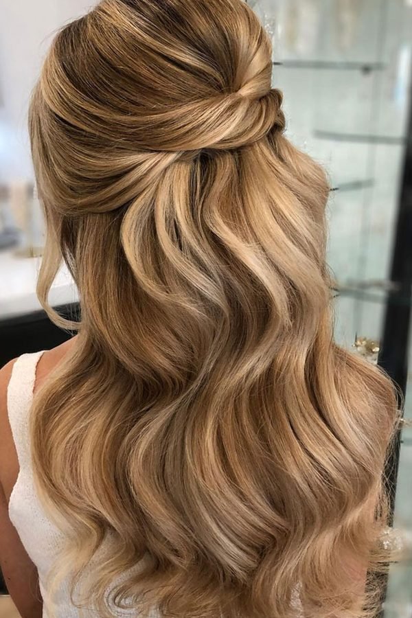 Half-up crown twists with rhinestone clips for New Year's Eve