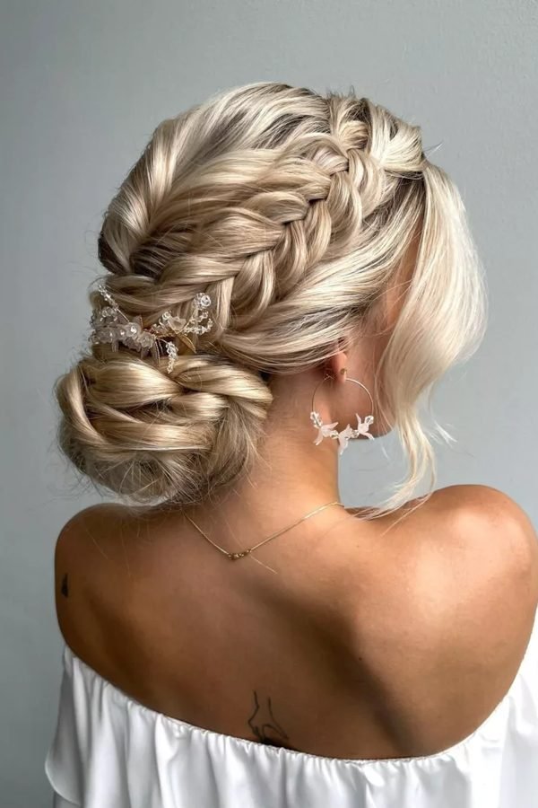 Fishtailed crown updo for New Year's Eve party