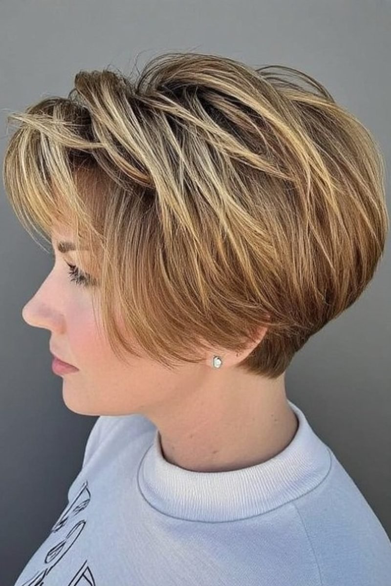 Honey blonde layered pixie-bob with textured layers