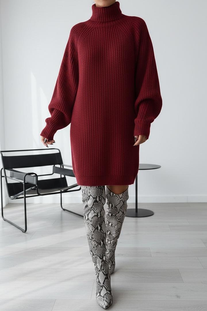 Burgundy ribbed turtleneck sweater dress styled with snakeskin over-the-knee boots
