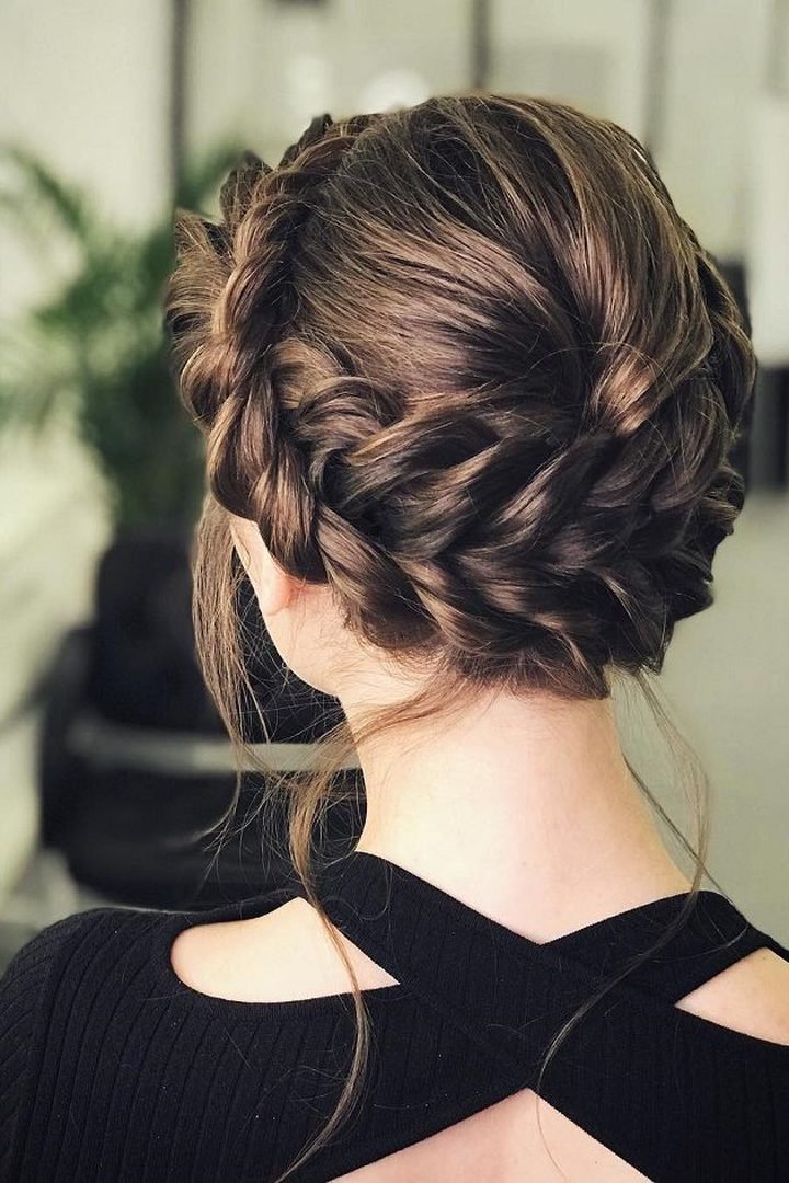 Back view of a milkmaid braided crown hairstyle