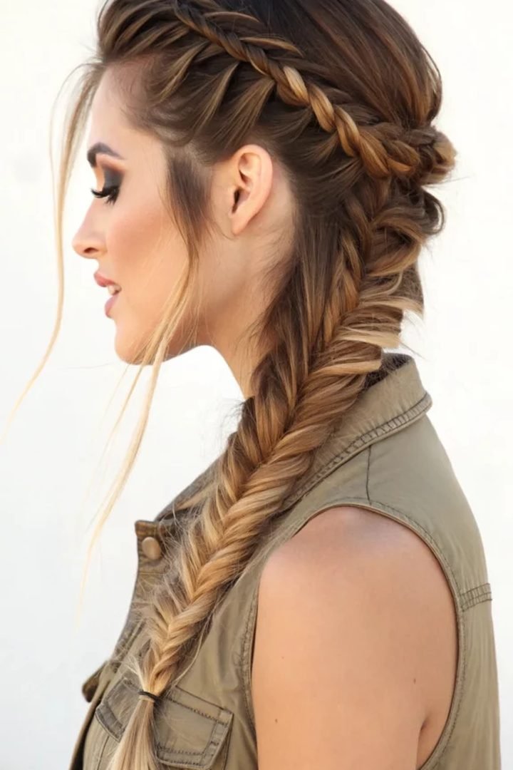 Side view of a fishtail braid hairstyle worn over one shoulder