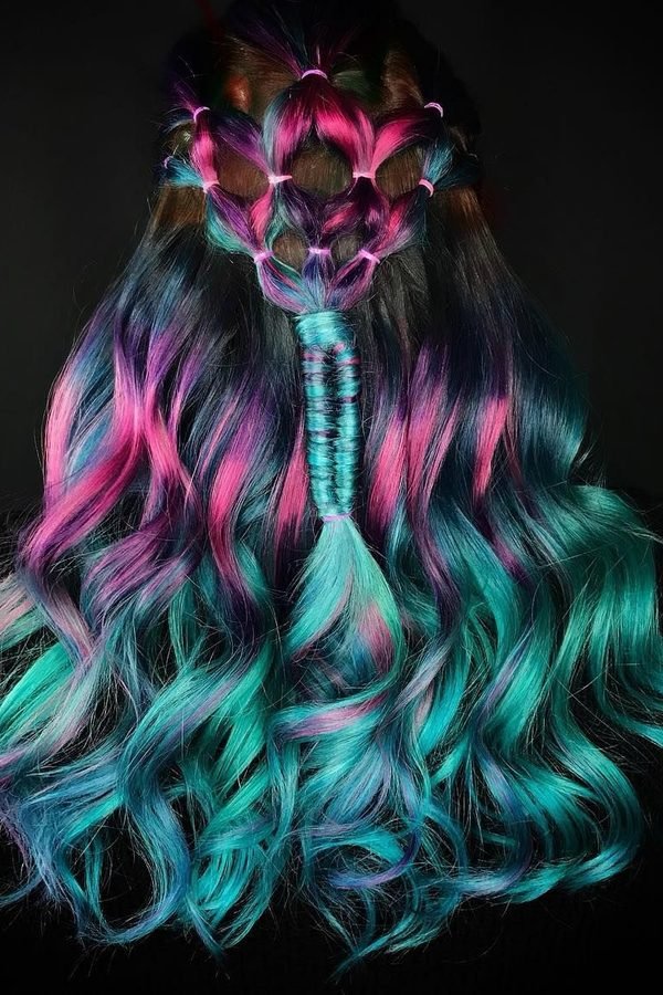 Voluminous curls in teal and magenta pink